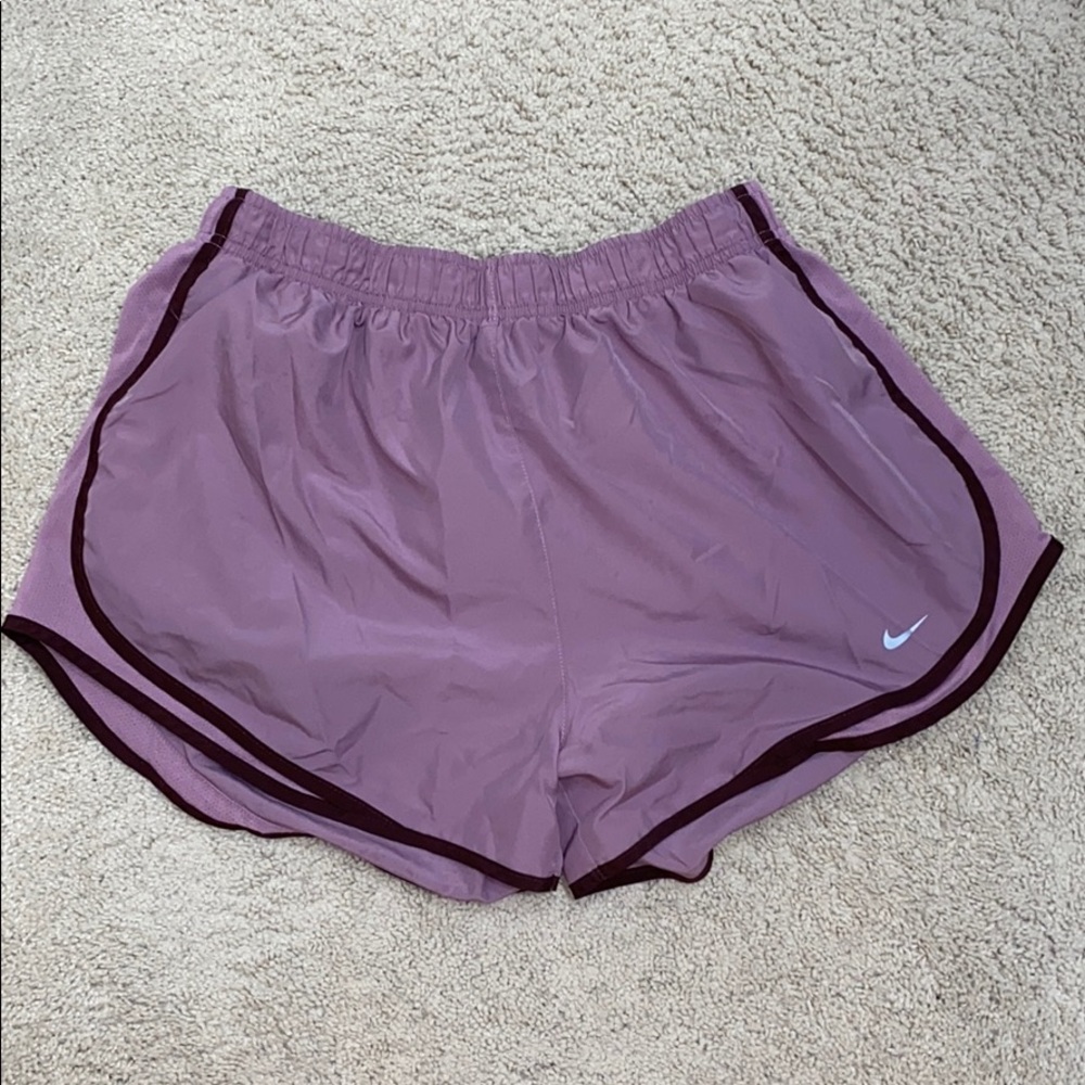 runs small! pink/purple nike shorts